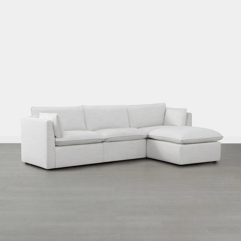 Divano componibile a L con penisola/pouf in crema/bianco, 4 pezzi, 4 posti