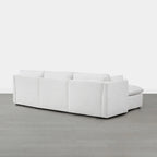 Divano componibile a L con penisola/pouf in crema/bianco, 4 pezzi, 4 posti