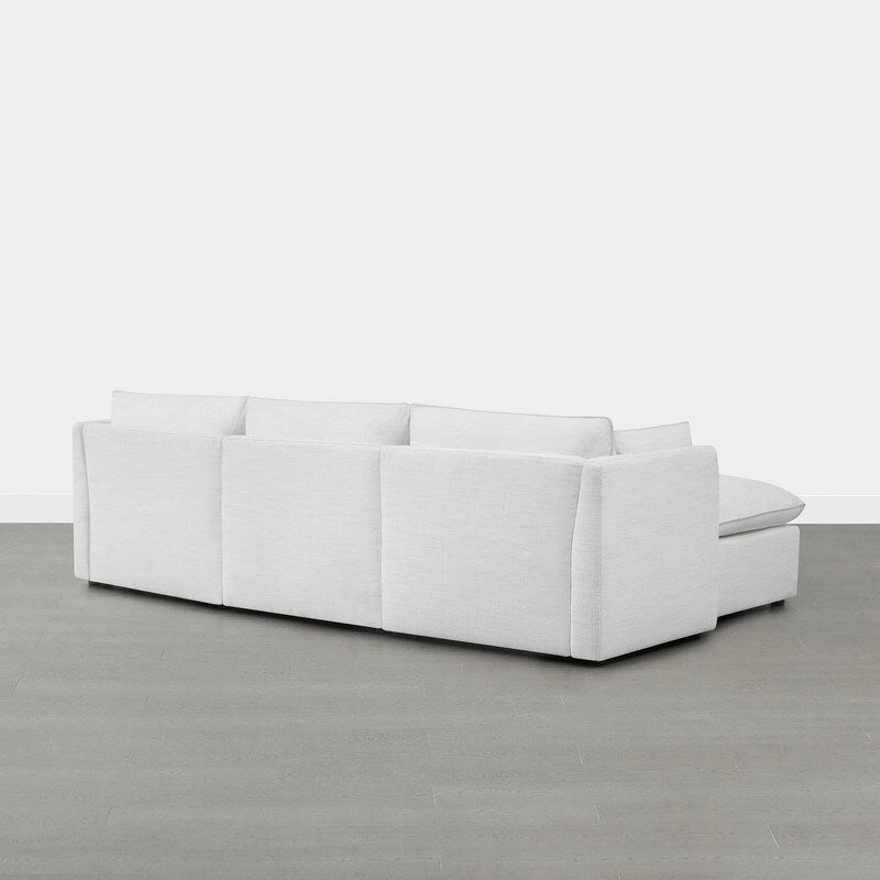 Divano componibile a L con penisola/pouf in crema/bianco, 4 pezzi, 4 posti