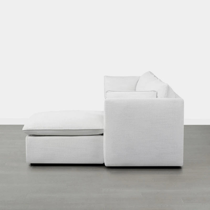 Divano componibile a L con penisola/pouf in crema/bianco, 4 pezzi, 4 posti