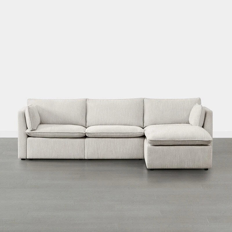 Divano componibile a L con penisola/pouf in crema/bianco, 4 pezzi, 4 posti