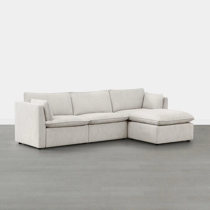 Divano componibile a L con penisola/pouf in crema/bianco, 4 pezzi, 4 posti