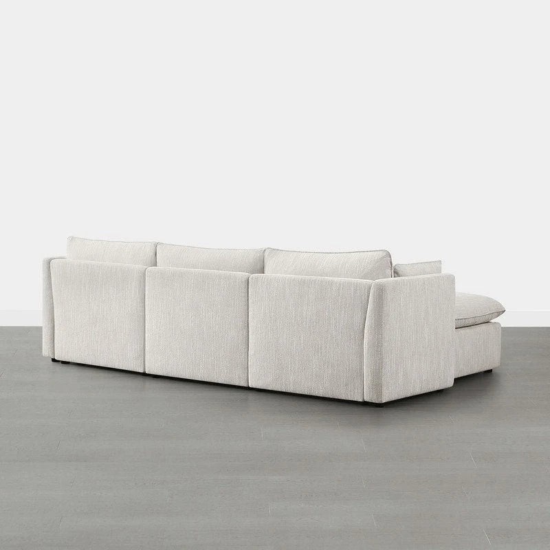 Divano componibile a L con penisola/pouf in crema/bianco, 4 pezzi, 4 posti