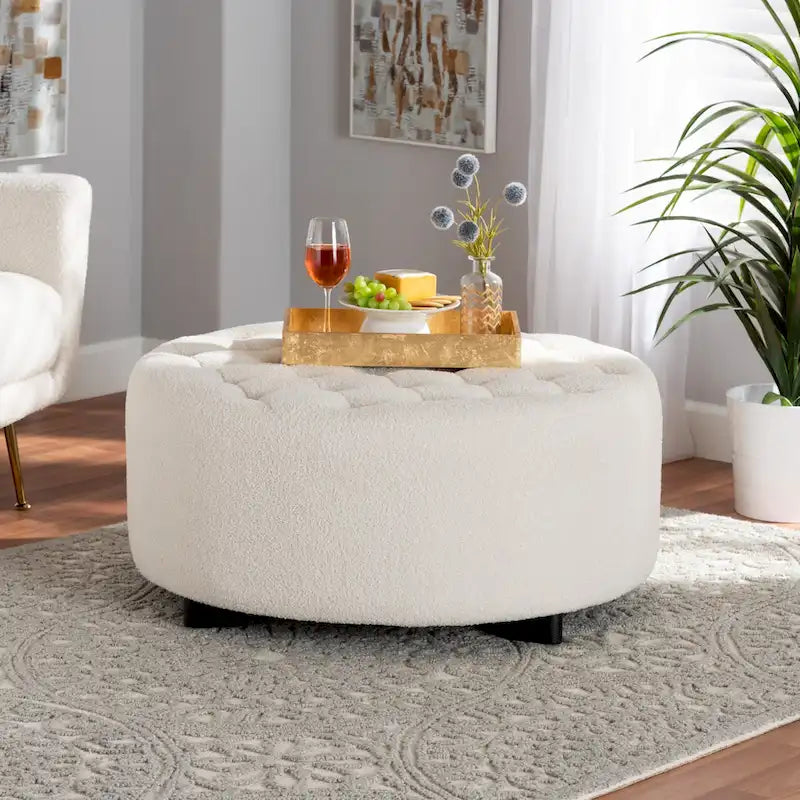 Pouf rotondo in bouclé color avorio, stile contemporaneo, seduta singola